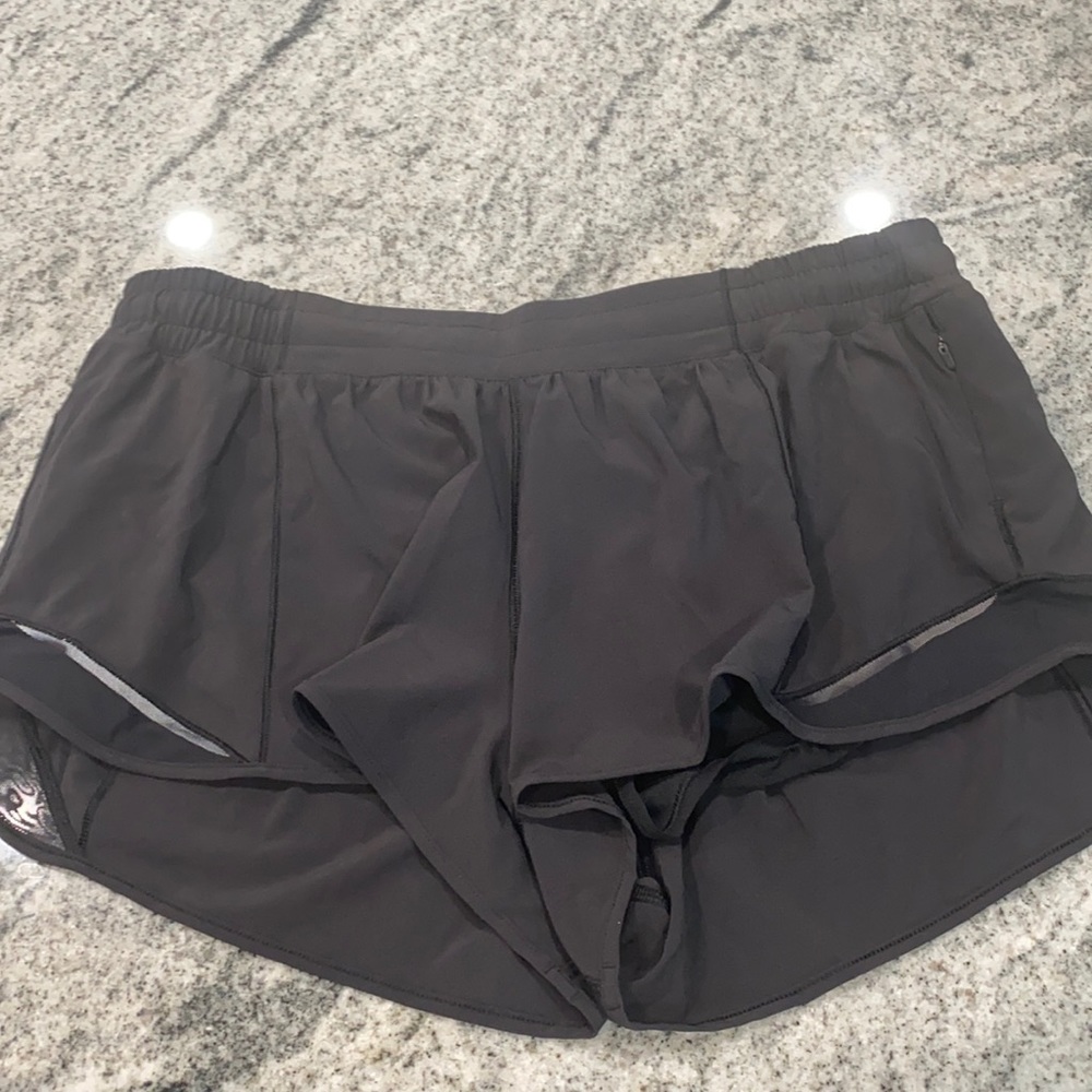 Black pair of size 14 lululemon shorts.